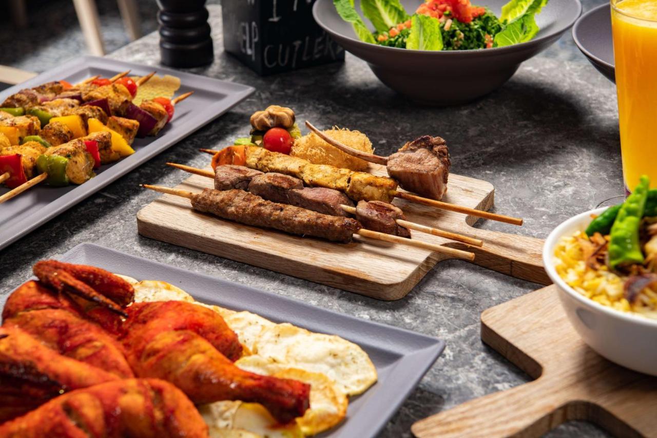 Park Inn By Radisson Makkah Aziziyah メッカ エクステリア 写真 A buffet at a luxury hotel