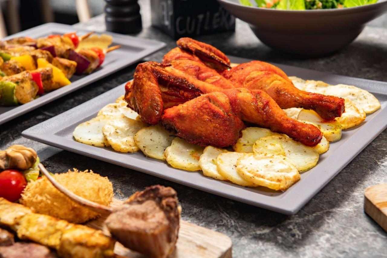 Park Inn By Radisson Makkah Aziziyah メッカ エクステリア 写真 A plate of chicken pakora