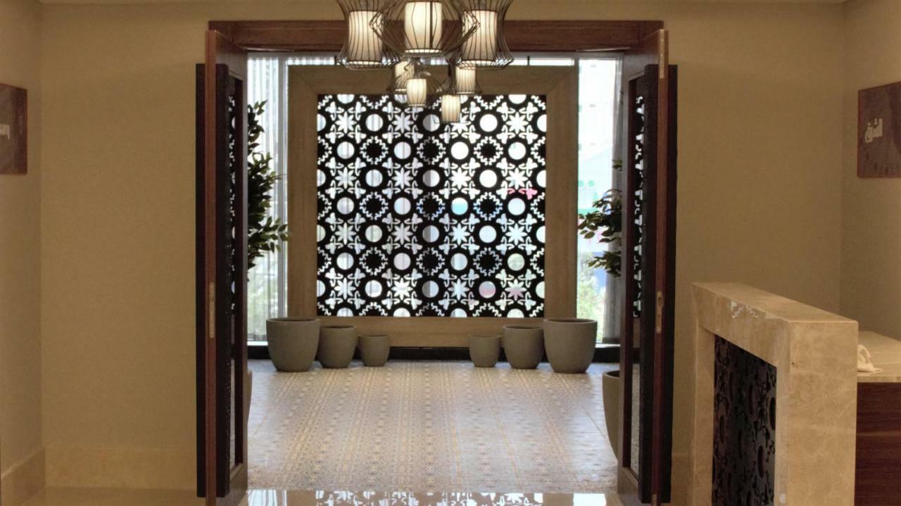 Park Inn By Radisson Makkah Aziziyah メッカ エクステリア 写真 A decorative panel of glass